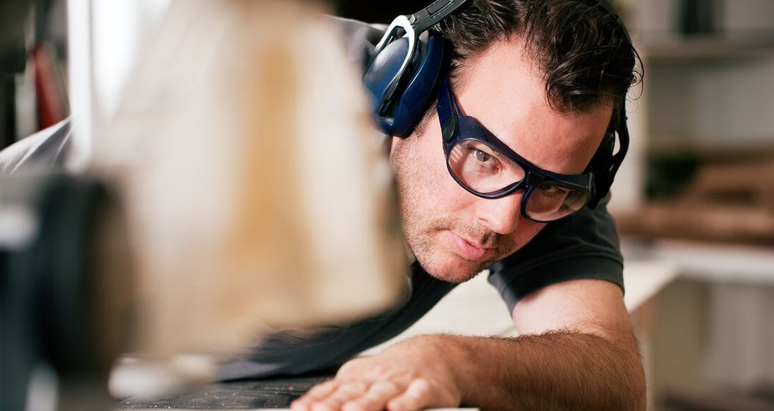 Man using saw - Tips for Using The Bridge Safety Glasses Program